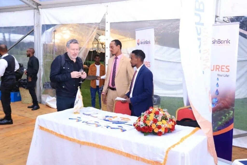 Awash Bank Representative and French Ambassador shaking hands